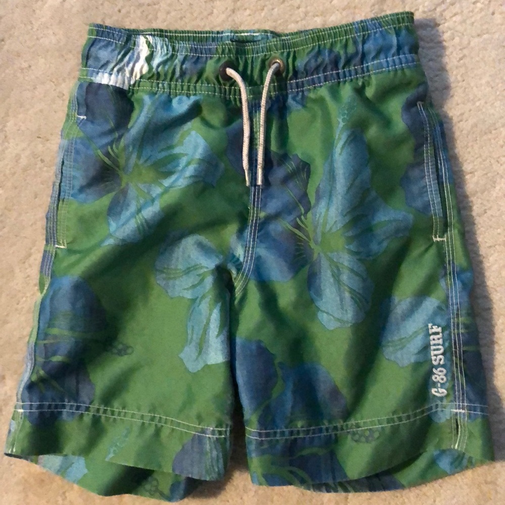 Boys blue and white tropical swim bottoms.